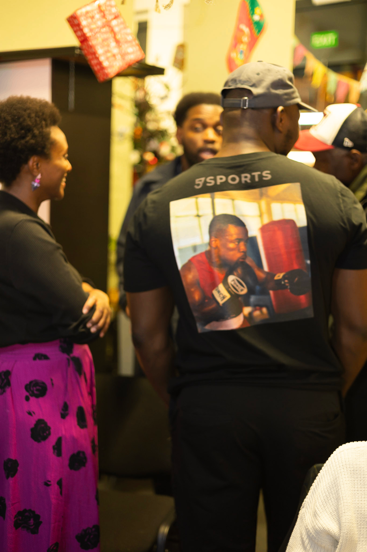 Guest wearing a 57Sports photo tee at the documentary showcase